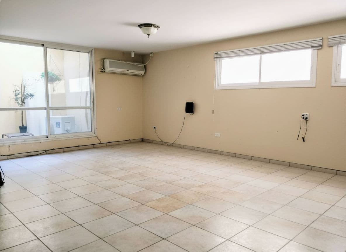 Empty room after AI furniture removal